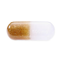 large acrylic pill gold glitter - front view