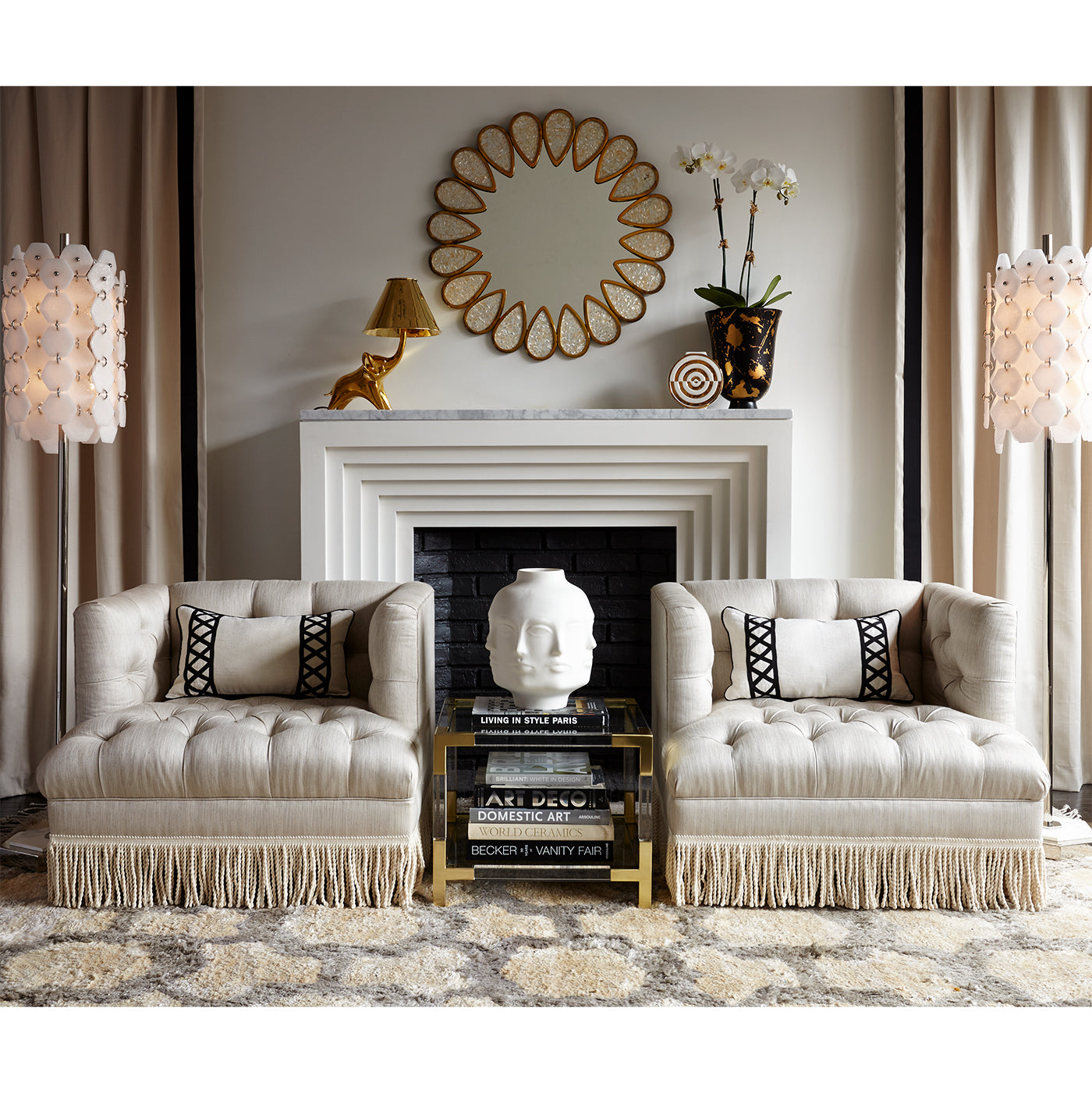 jacques two-tier accent table baxter t-arm chairs with bullion fringe living room - styled view