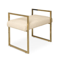 Chair with gold frame and beige cushion on a white background