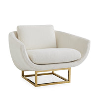 Modern armchair with white cushioned seat and backrest on a gold metal frame against a white background