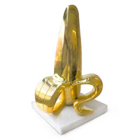 brass banana marble base