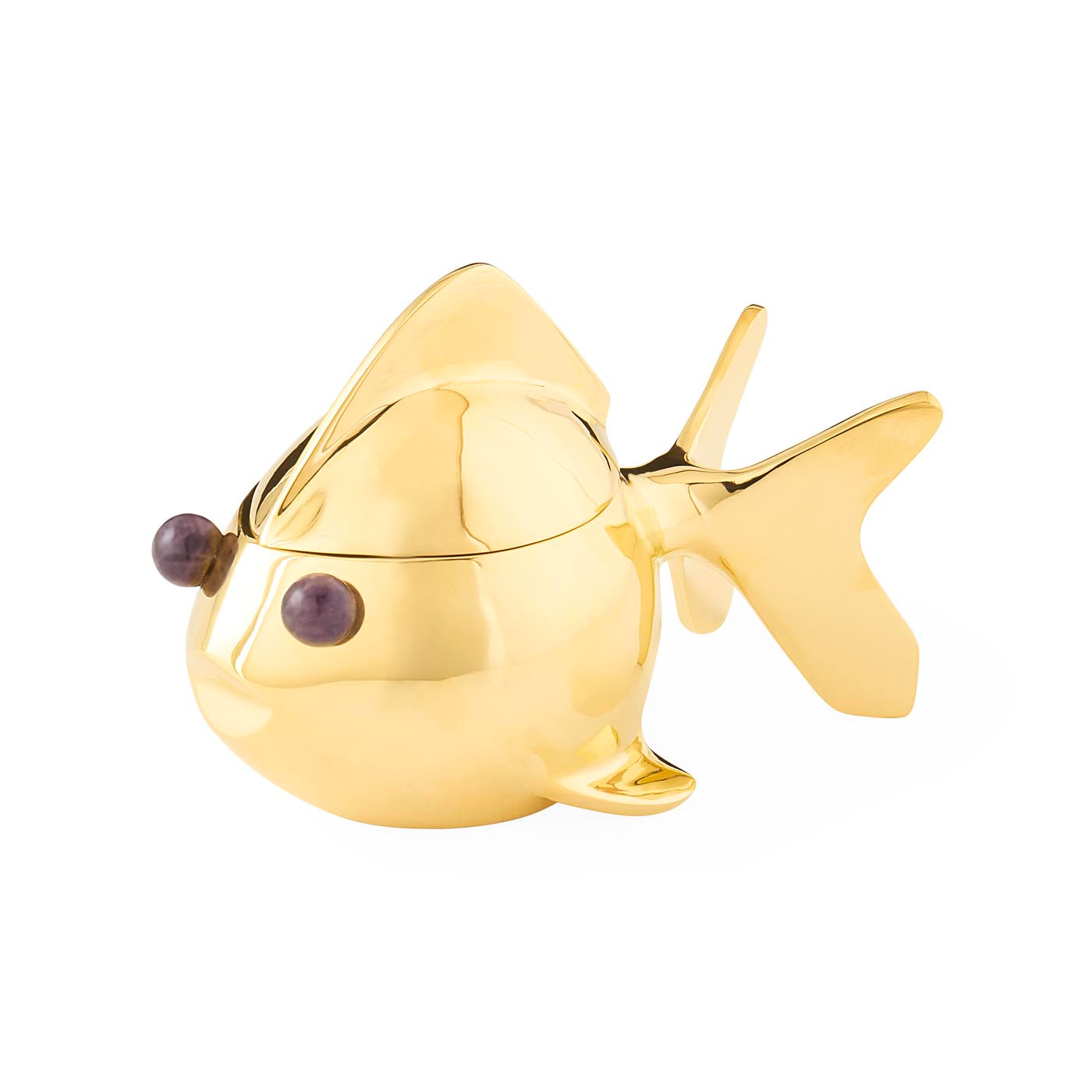 Gold fish-shaped object on a white background