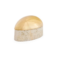 Decorative box with a gold lid and speckled beige body on a white background
