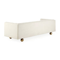 claridge apartment sofa belfast stone linen brass orb feet - angle back view