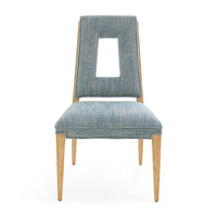 Chair with blue patterned seat and backrest on a white background