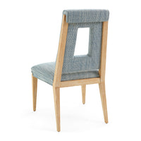 Chair with gray cushioned backrest and seat on a white background