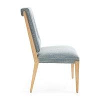 Chair with gray upholstered seat and backrest on a white background