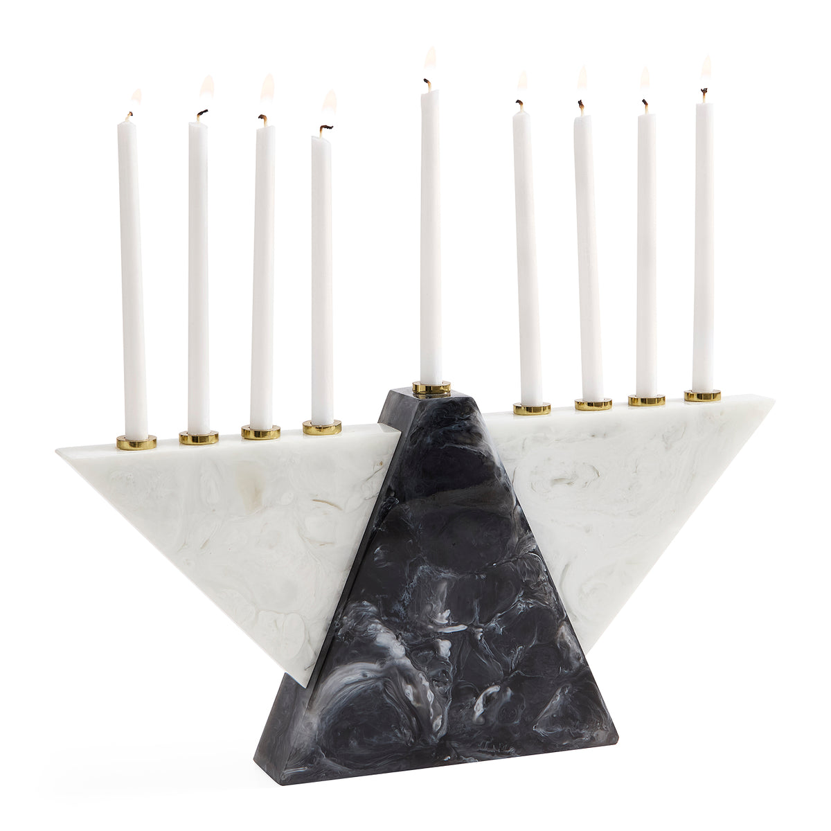 A modern Hanukkah menorah made of white and black marble with gold-tone metal candle holders, holding nine white taper candles that are lit, set against a solid white background.