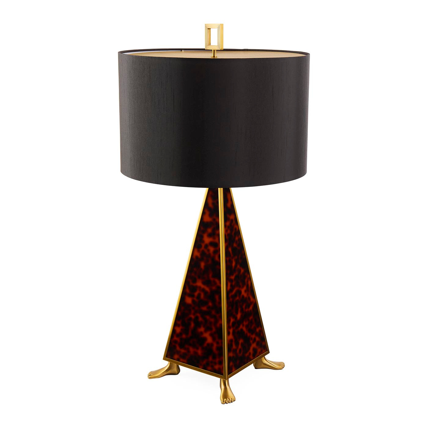 Table lamp with black shade and tortoiseshell base on a white background
