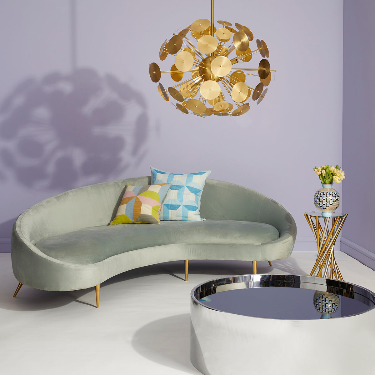 sorrento square pillow ether curved sofa alphaville cocktail table - styled view