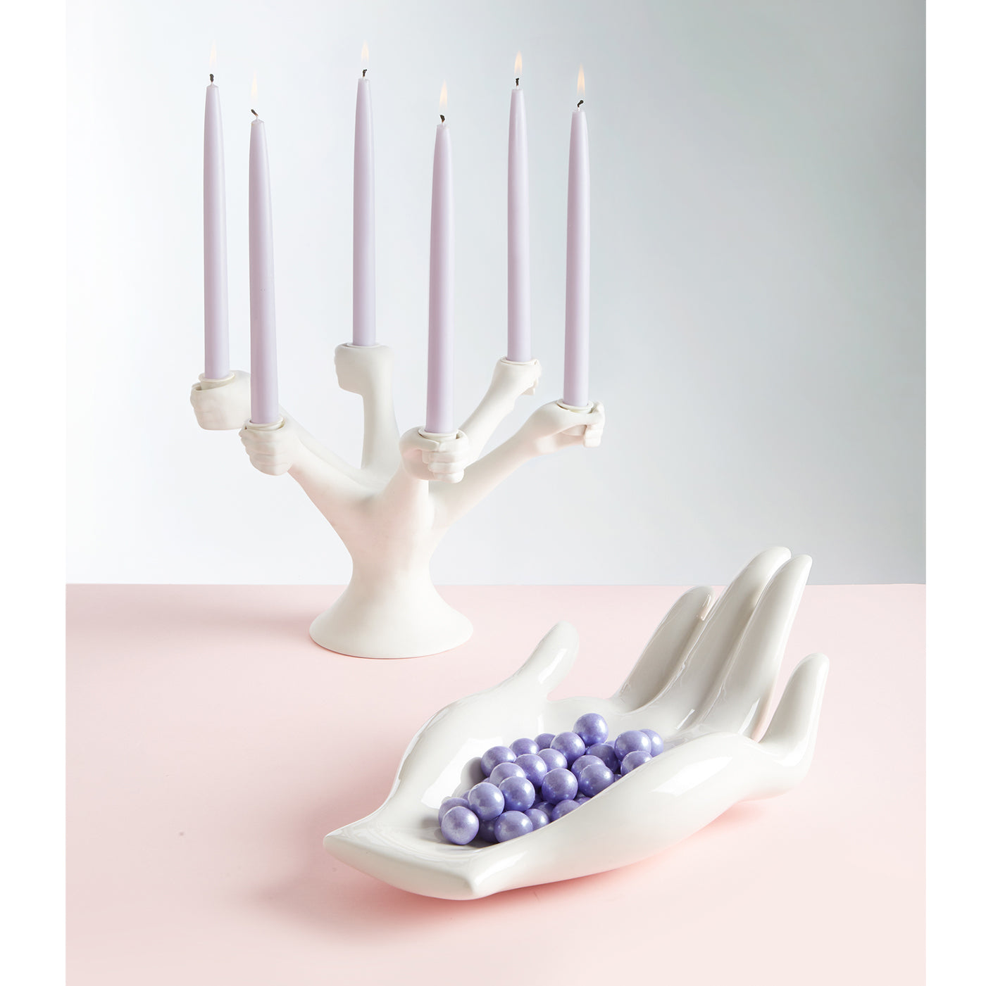 eve candelabra eve fruit bowl pink background - styled view