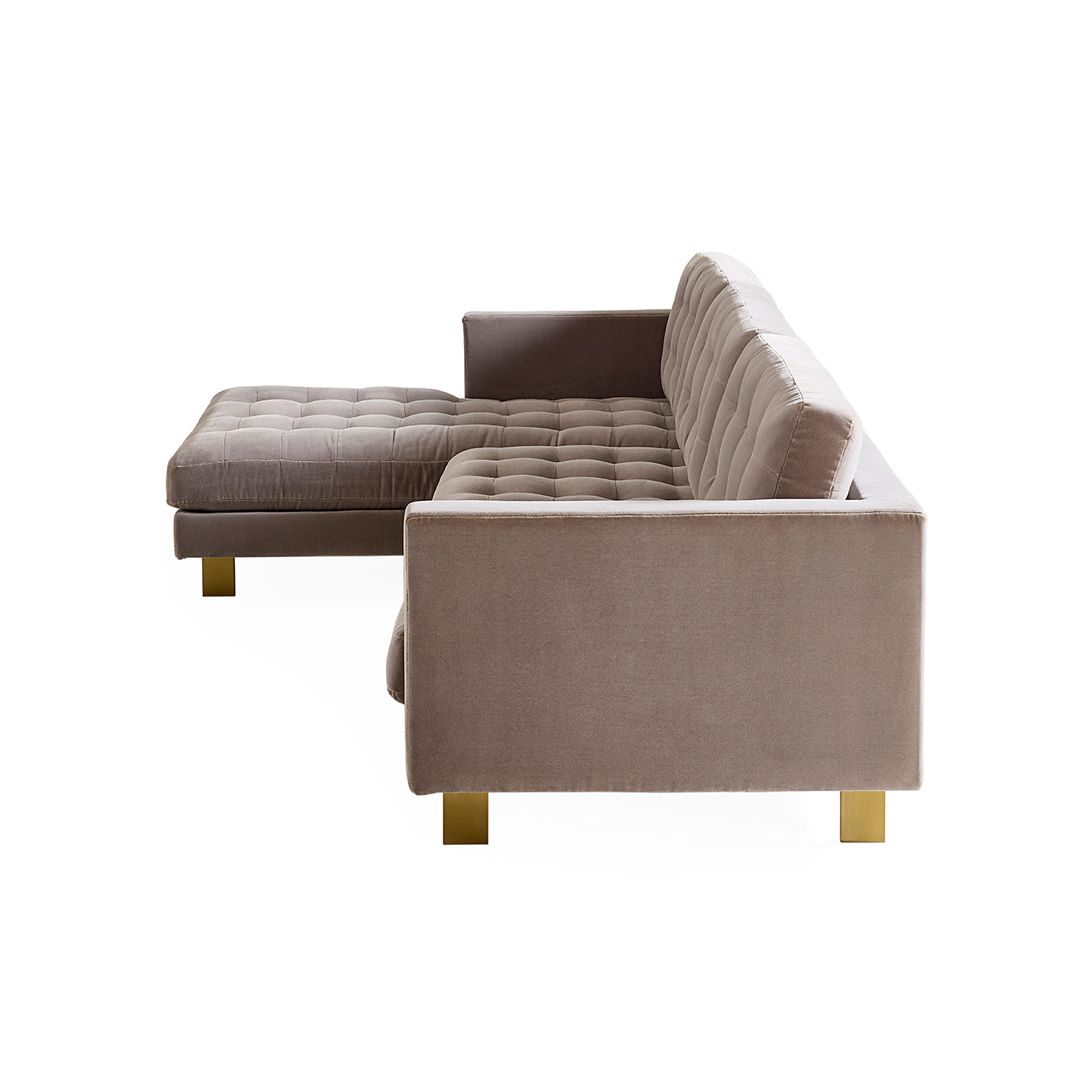 Gray sectional sofa with ottoman on a white background