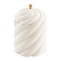A white ceramic container with a lid, featuring a sculpted spiral twist design and a small gold finial on top, set against a plain white background.