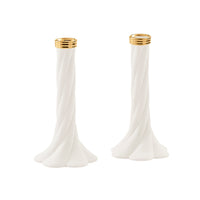 A pair of white twisted candlestick holders with polished gold metal rims at the top, displayed on a clean white background.