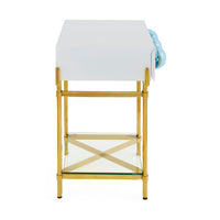 Gold side table with glass shelves on a white background