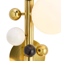 Gold spherical light fixture with white, black, and gold spheres on a white background