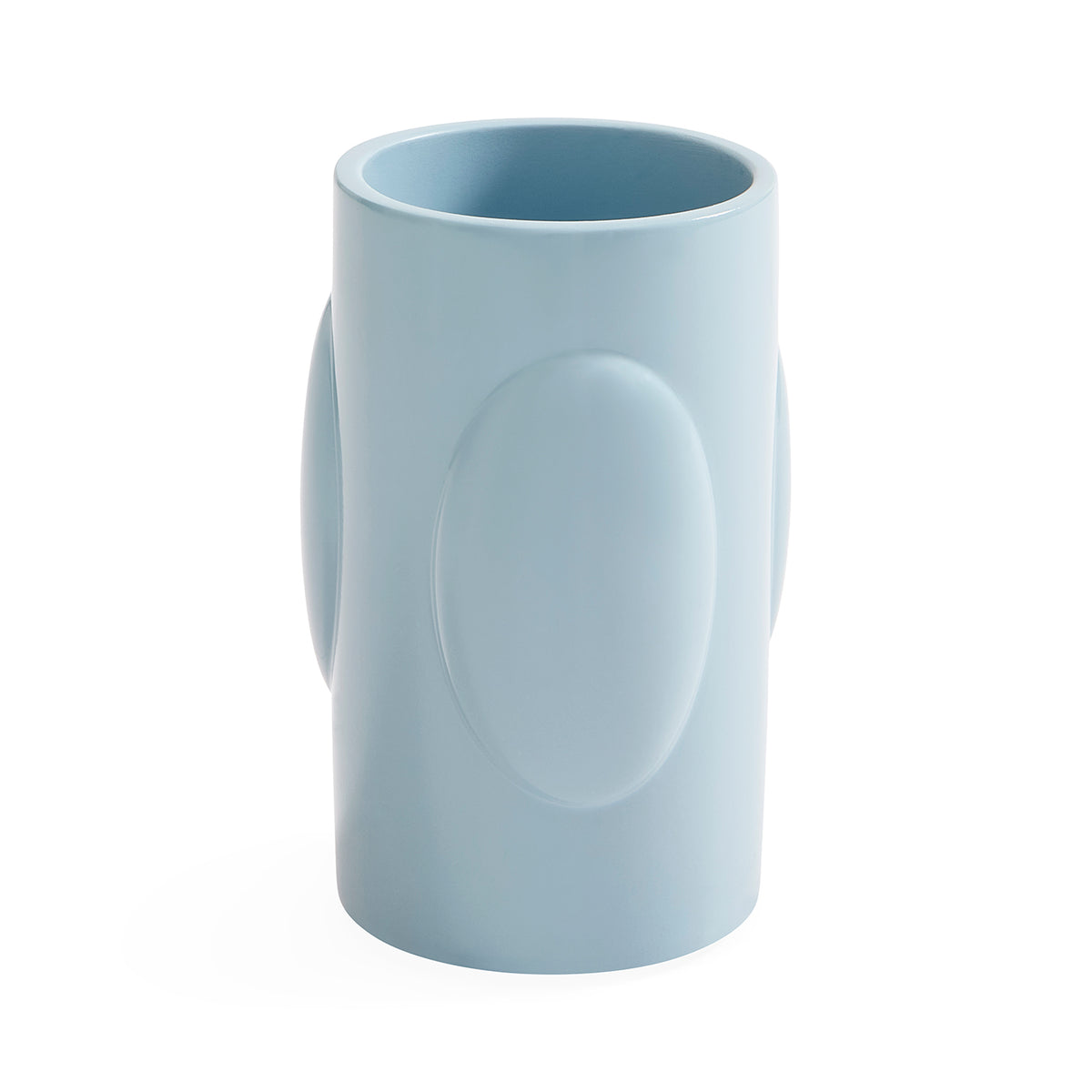A light blue ceramic mug with a unique sculptural design featuring a large oval embossed on the front and side handles, shown on a plain white background.