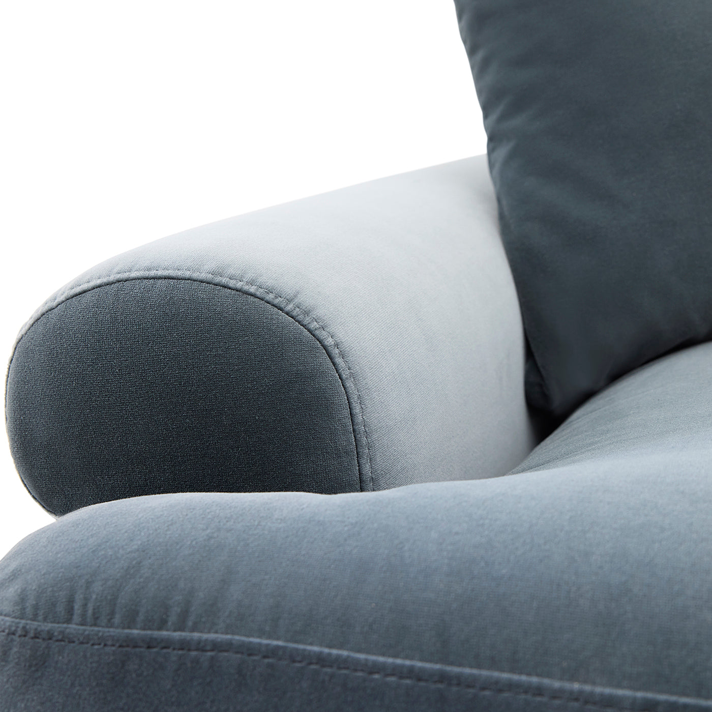 Gray cushioned chair with a pillow on a white background