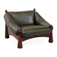 Green leather armchair with wooden legs on a white background