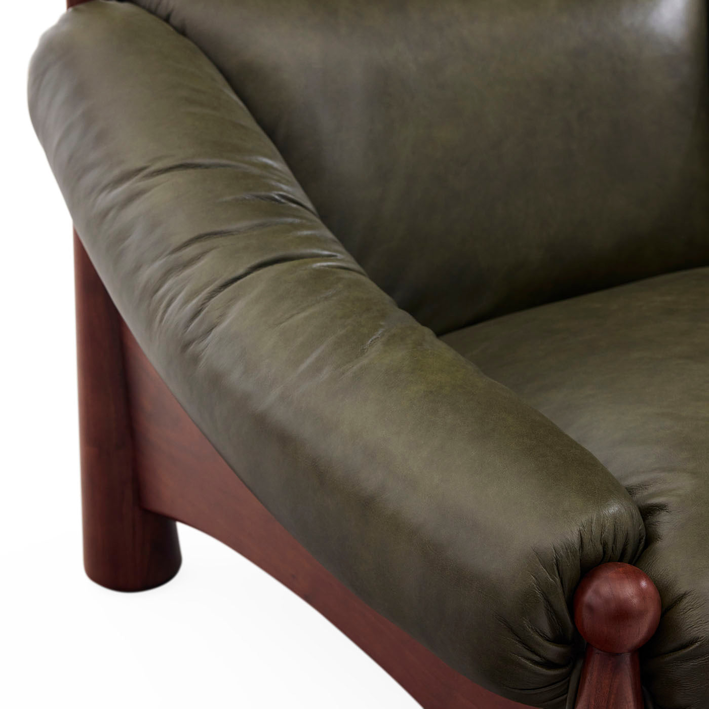 Close-up of a green upholstered chair with wooden armrests on a white background