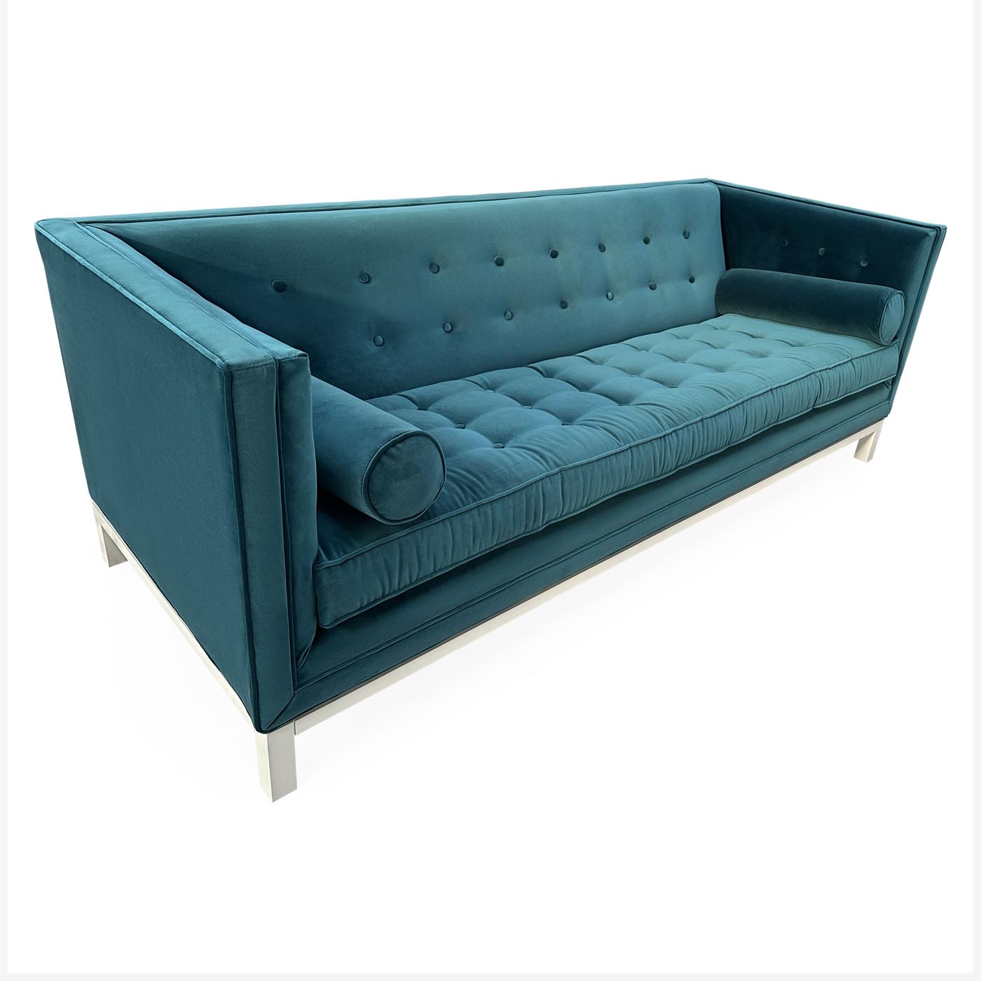 Teal sofa with tufted backrest on a white background