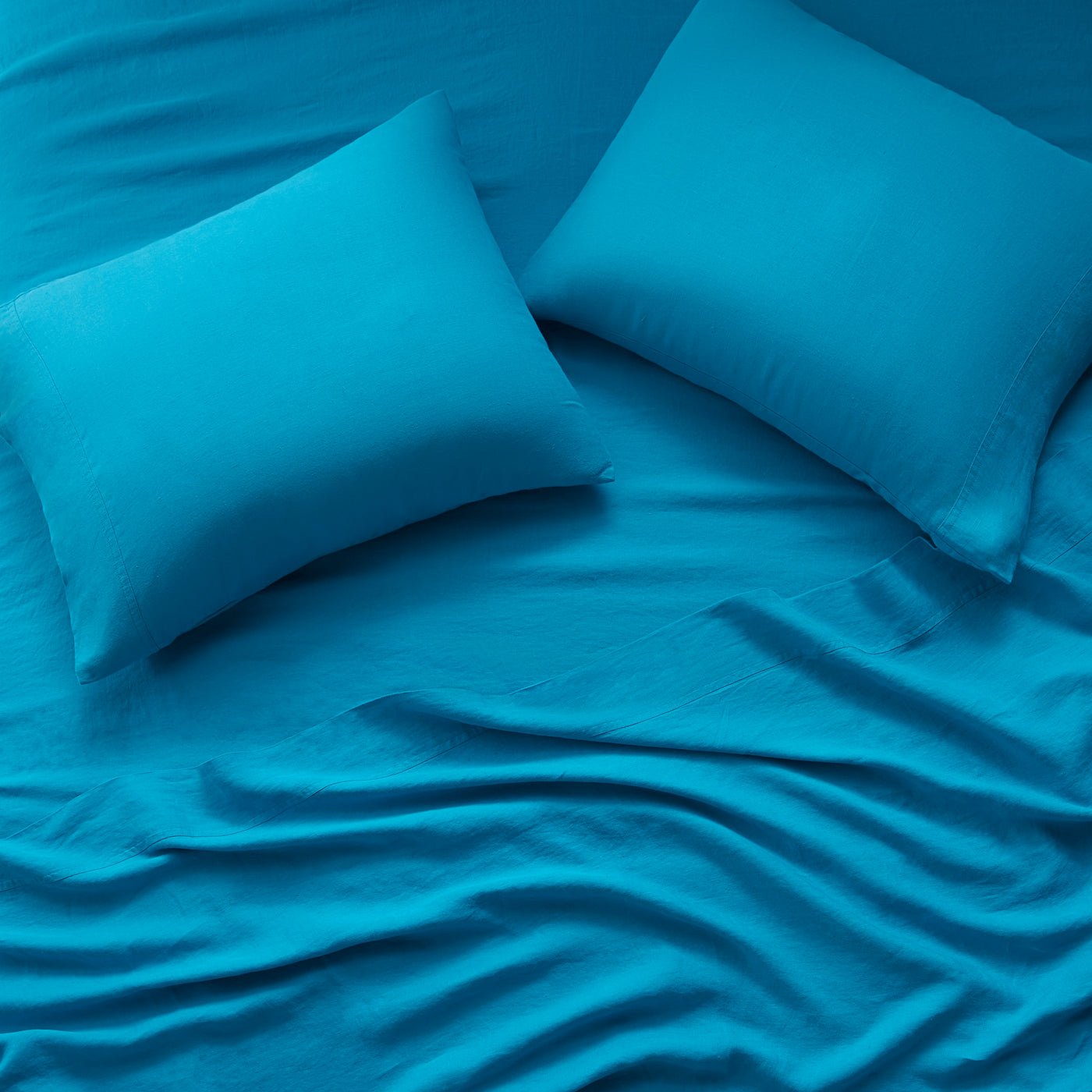 getaway linen sheet set teal - styled view