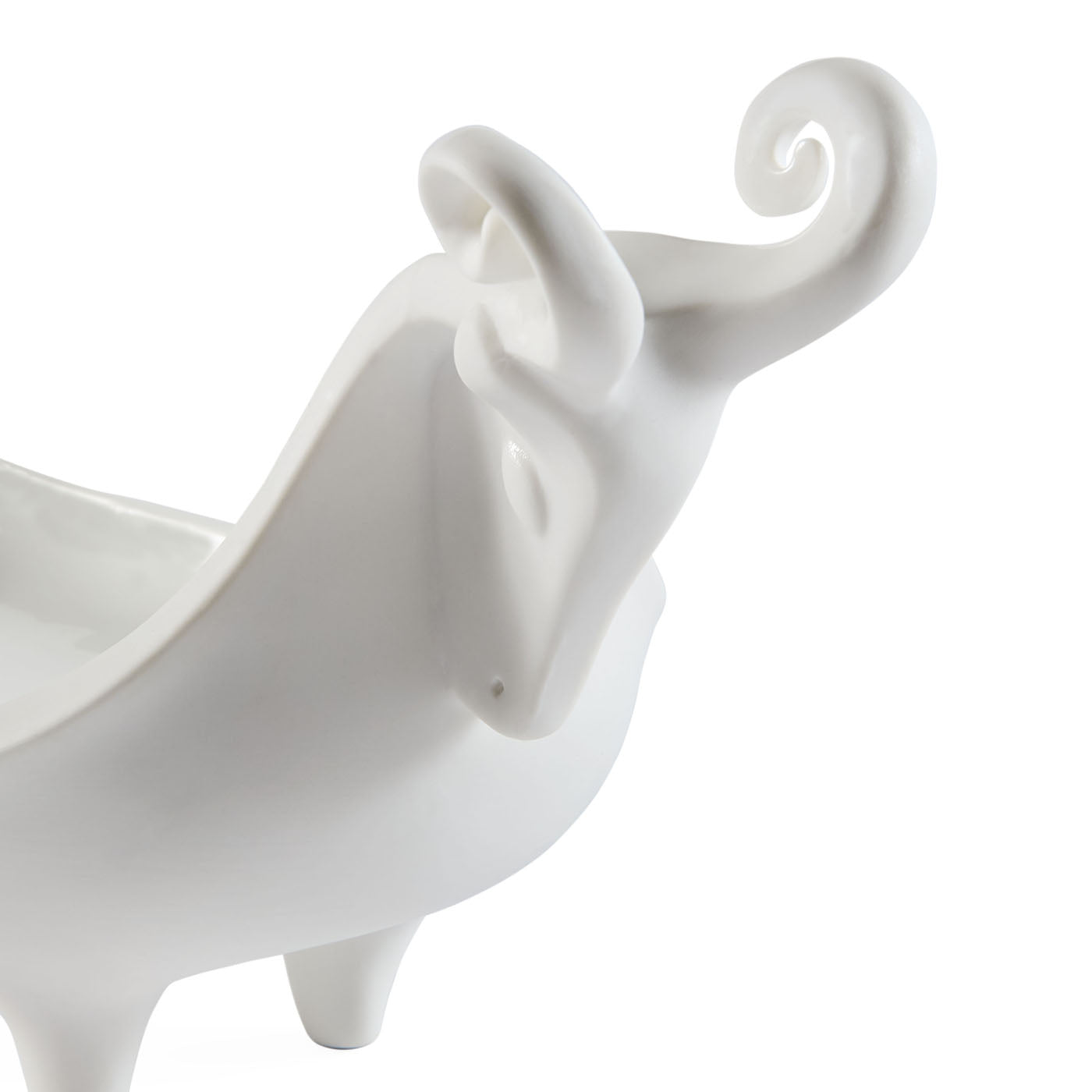 White ceramic elephant planter on a white background