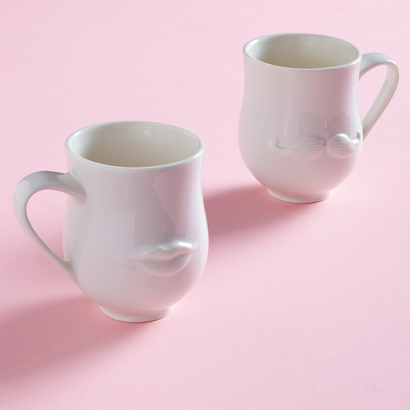 mr. and mrs. muse reversible mug pink background - styled view