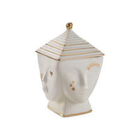Decorative ceramic head-shaped vase with gold accents on a white background