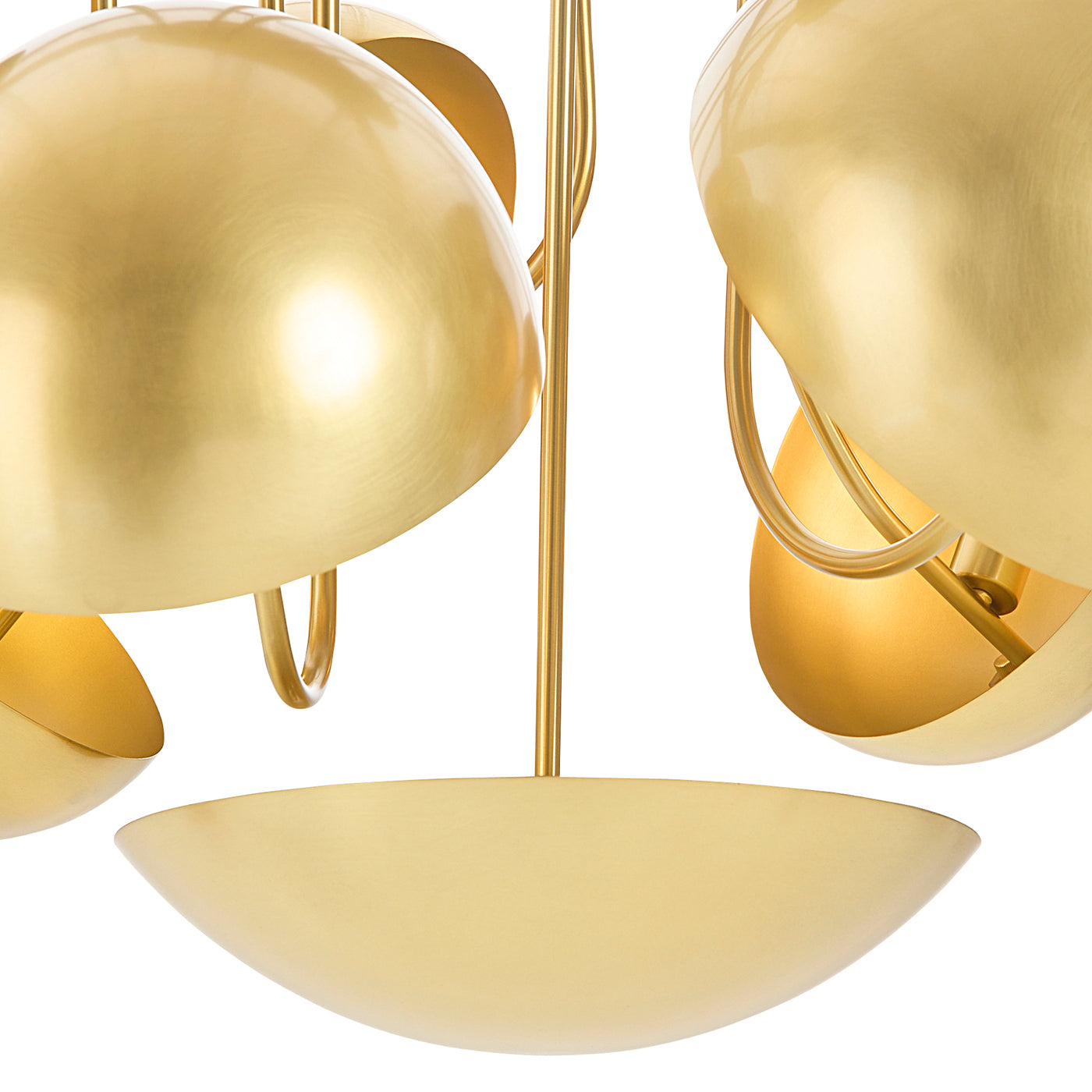 Close-up of a gold chandelier with multiple spherical lampshades.