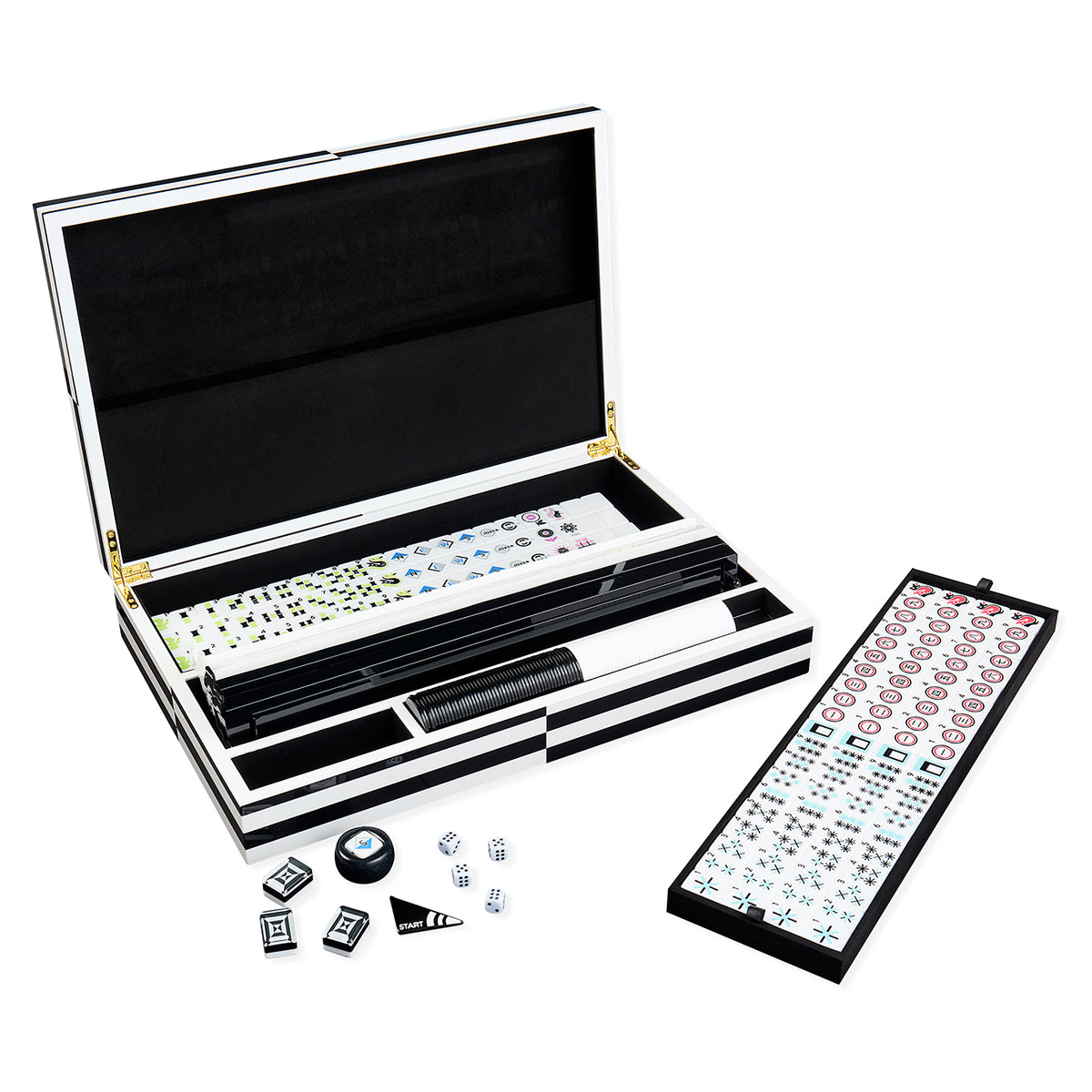 Open mahjong set with a black-and-white carrying case, a long black tile holder, a backboard with tiles, and a few loose tiles and dice on a white background.