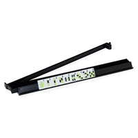 A black LED grow light bar shown in two pieces, with one piece offset to reveal the white heat sink and green-coated LED chips.