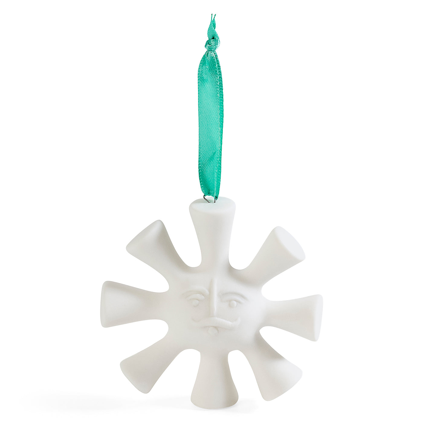 A white ceramic ornament shaped like a sun with a face and rays, hanging from a shiny teal ribbon on a white background.