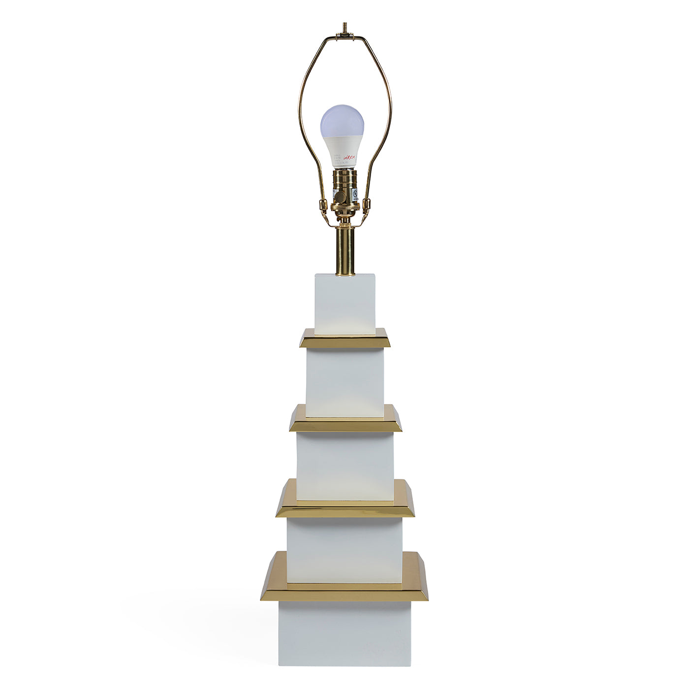 Decorative lamp with white and gold base on a white background