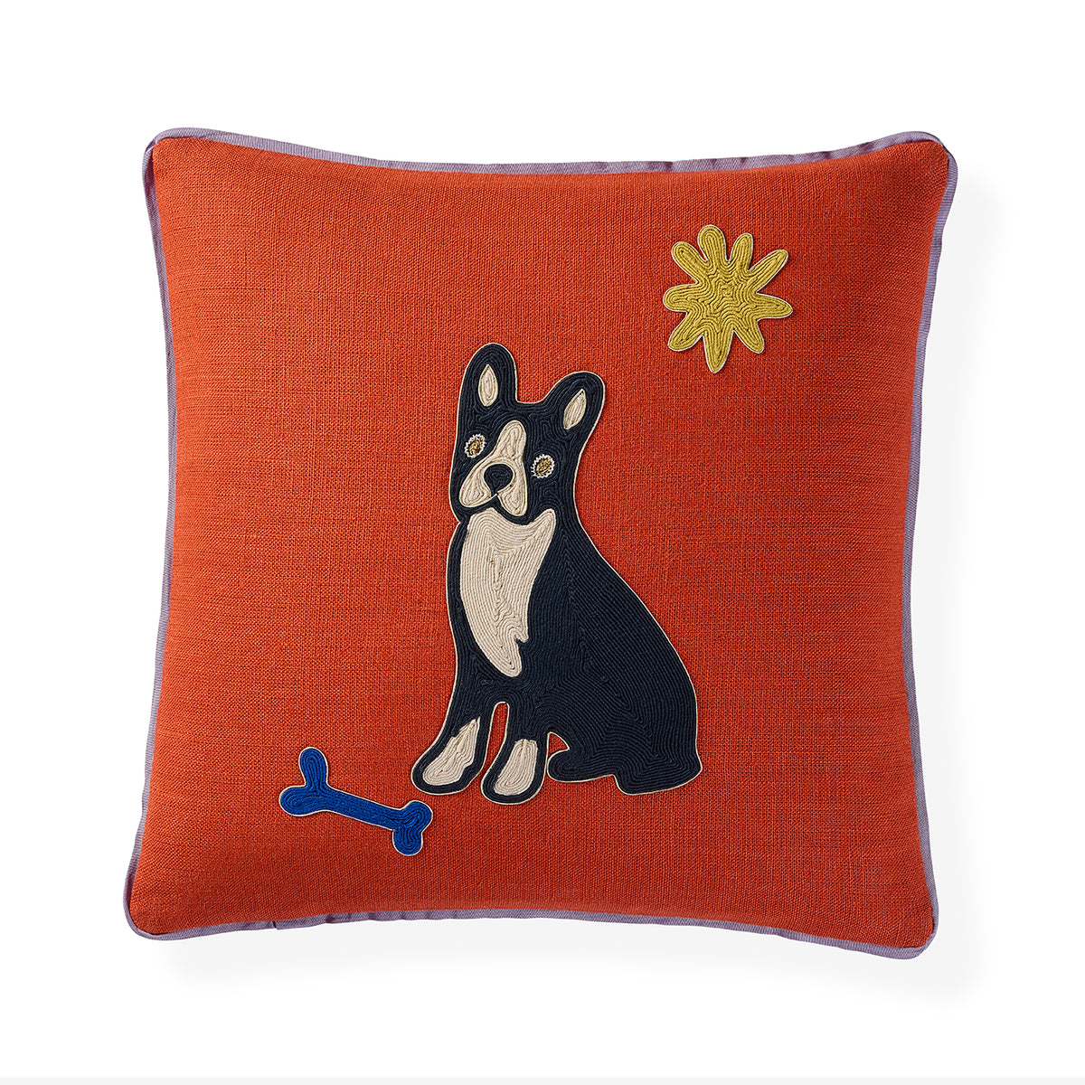 An orange textured throw pillow featuring an embroidered black and white Boston Terrier dog, a blue bone, and a yellow star on a white background.