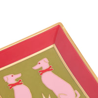 Close-up of a square decorative tray with a gold rim, a pink interior border, and a green center featuring two pink dogs wearing red collars.