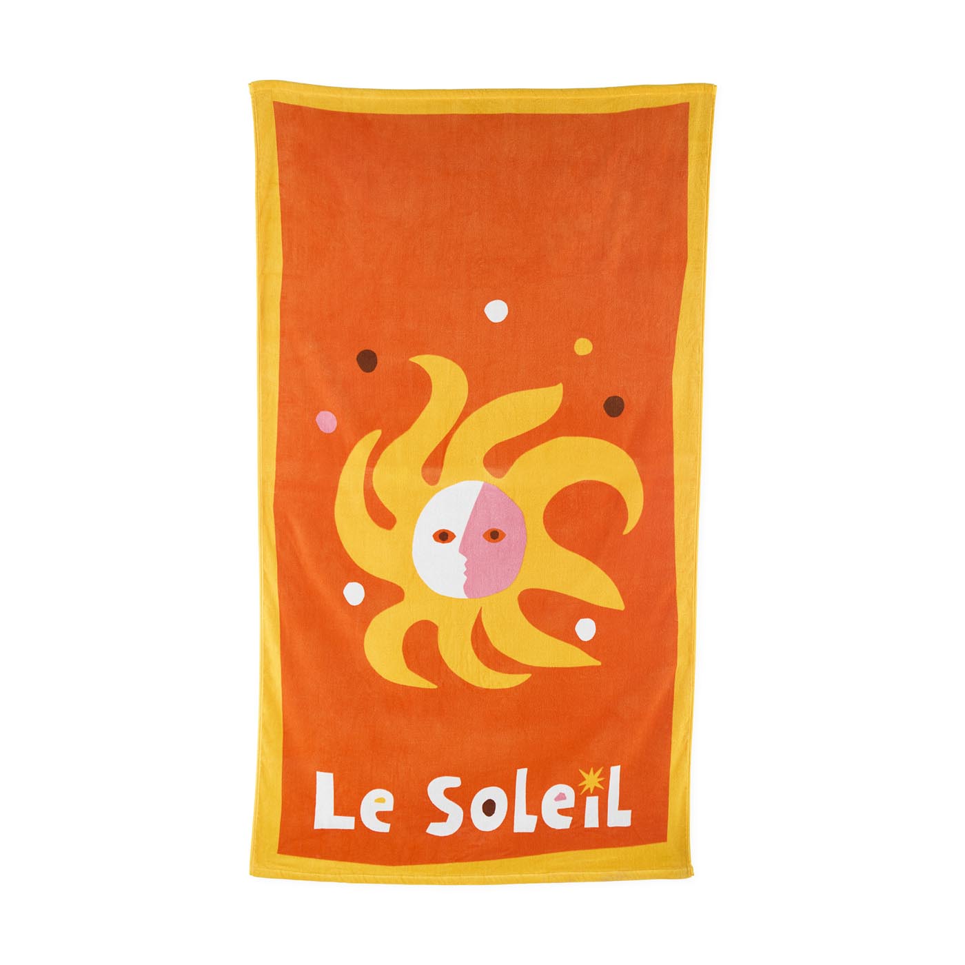 Orange towel with a sun design and 'Le Soleil' text on a white background