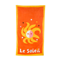 Orange towel with a sun design and 'Le Soleil' text on a white background