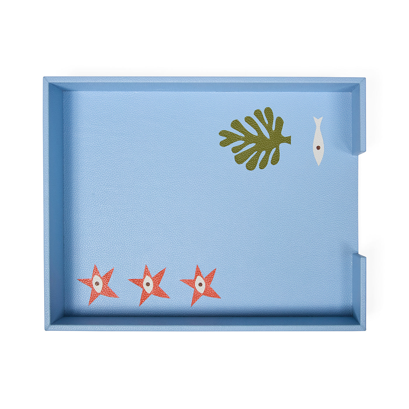 Decorative tray with starfish, leaf, and fish designs on a light blue background