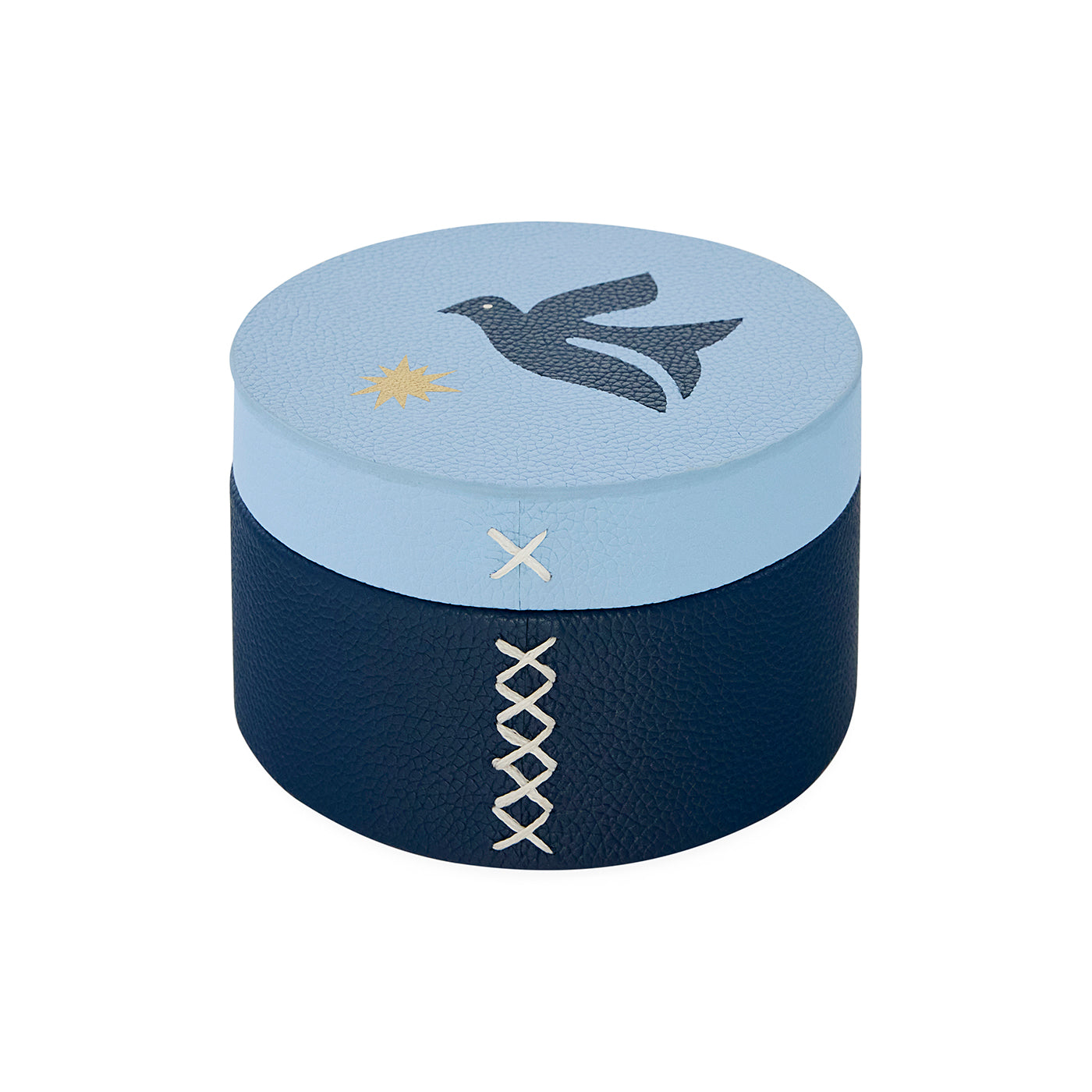 Round decorative box with blue top and navy bottom, featuring a bird and star design.