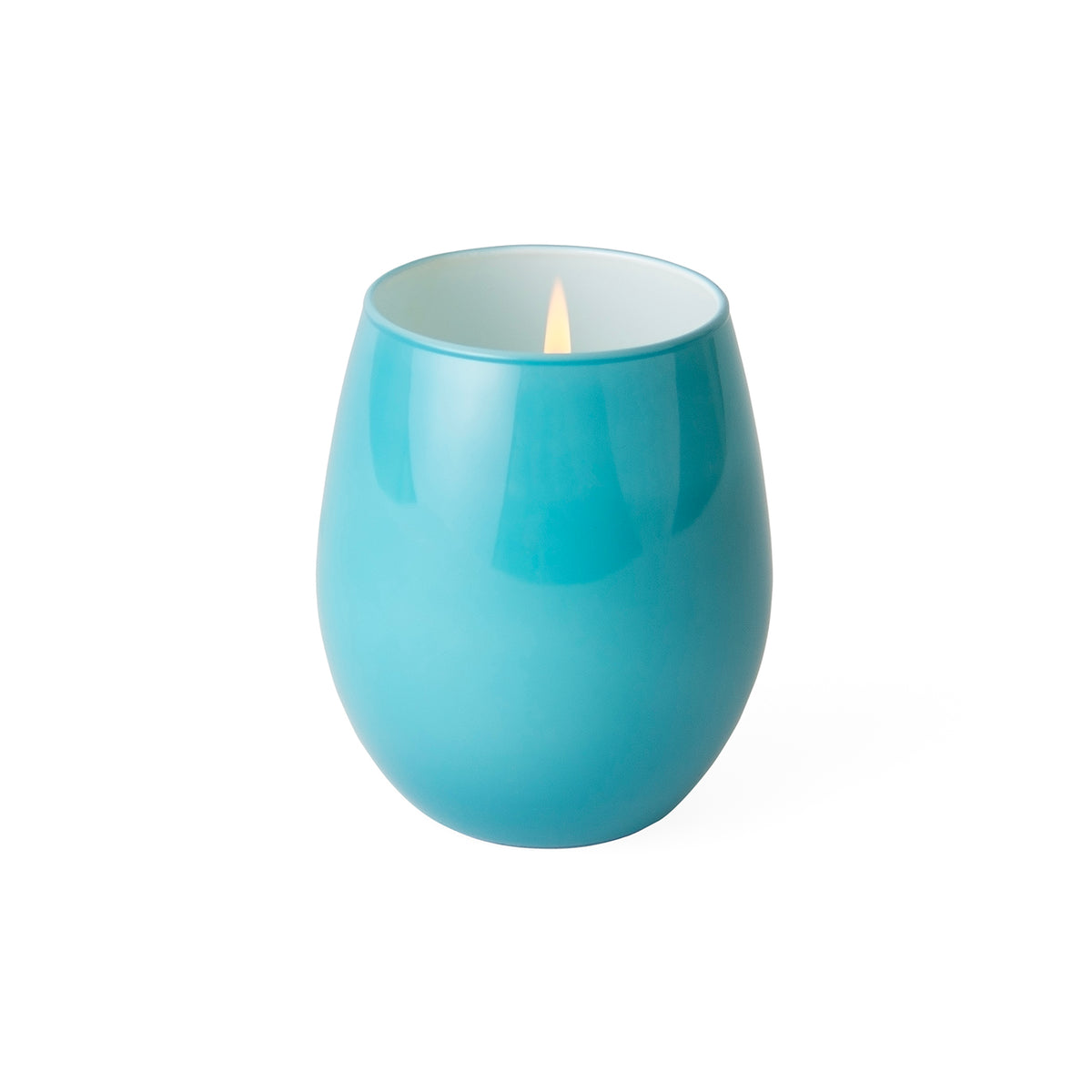 A glossy teal blue ceramic candle holder with a lit candle inside, set against a plain white background.