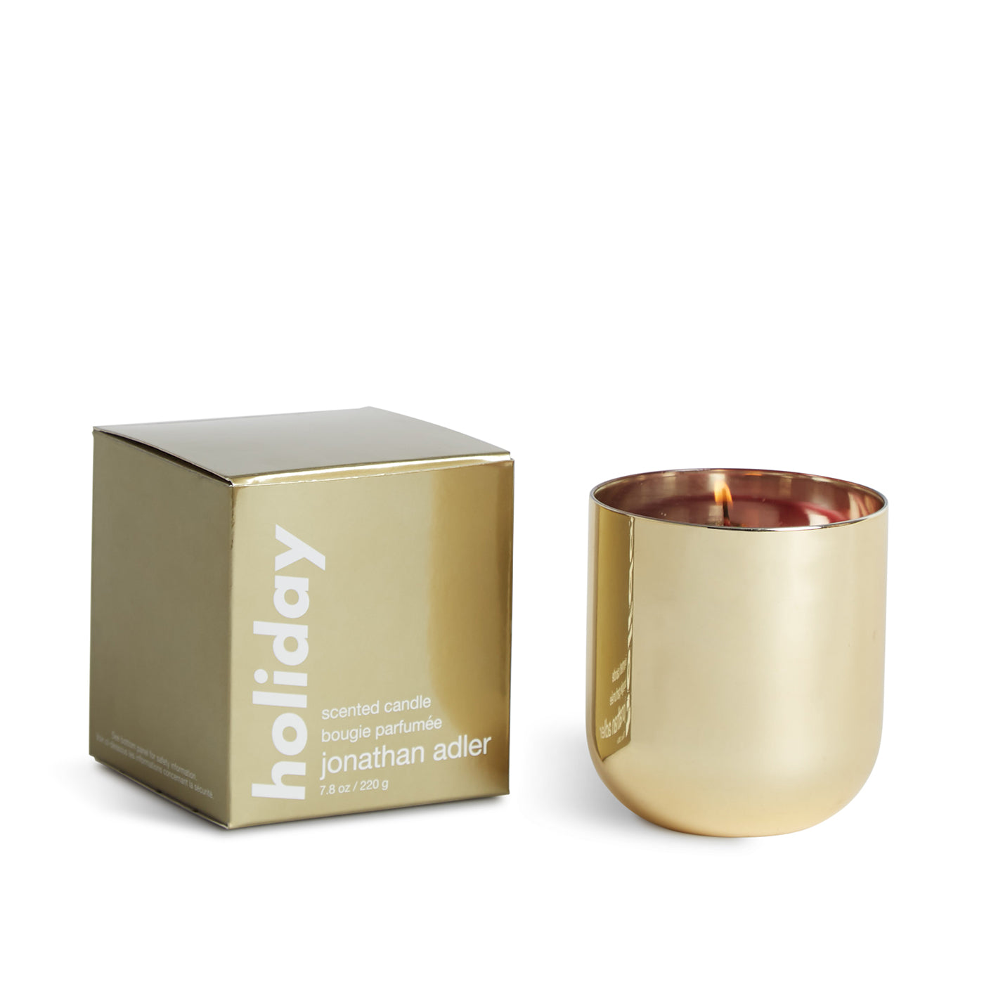 holiday pop candle glass gold wax red with open box - angle view