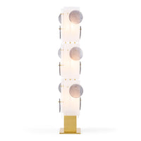 Modern floor lamp with circular design on a white background