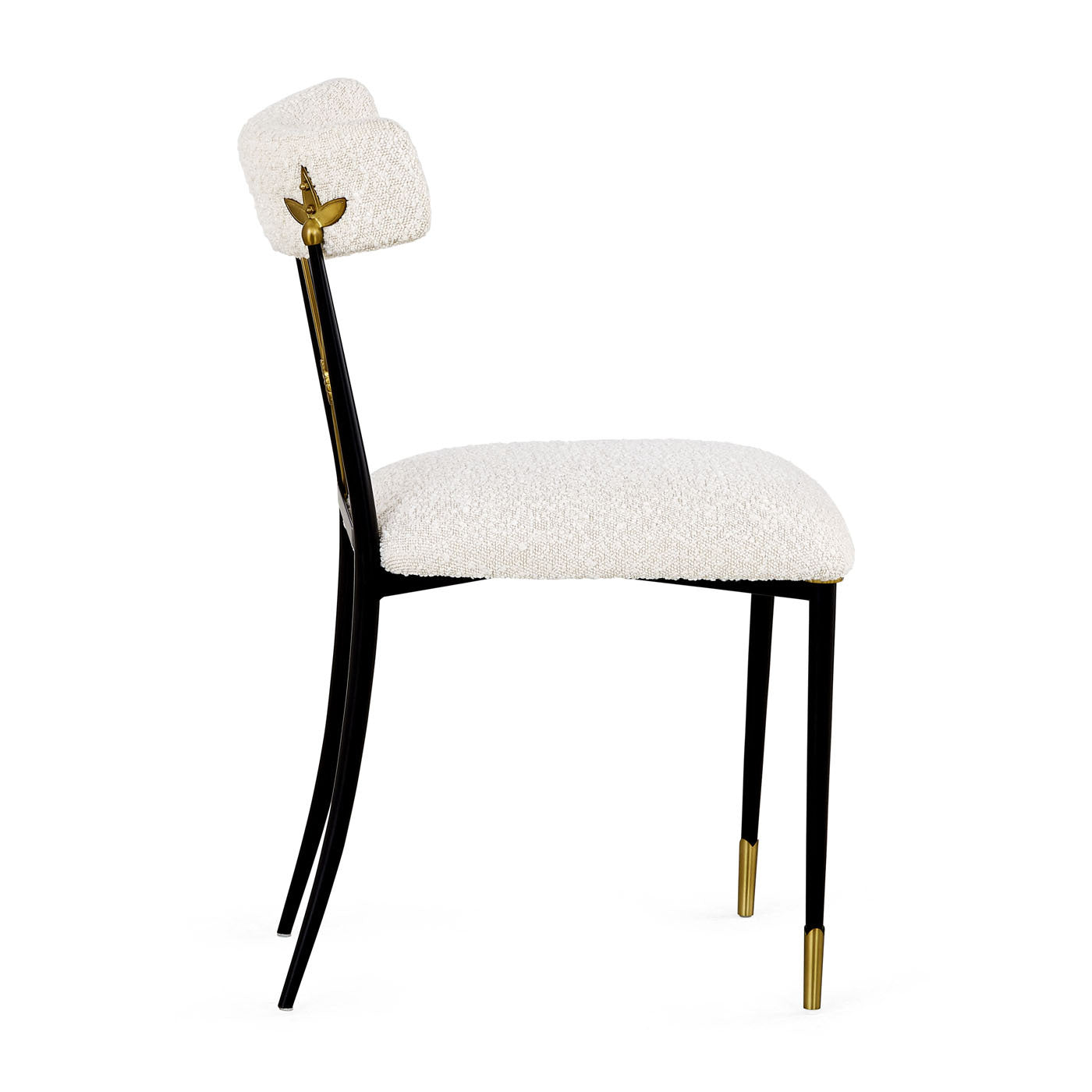 Chair with white cushioned seat and backrest, black legs with gold accents on a white background