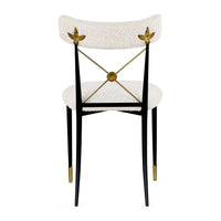Chair with white cushioned backrest and seat, gold accents, on a white background