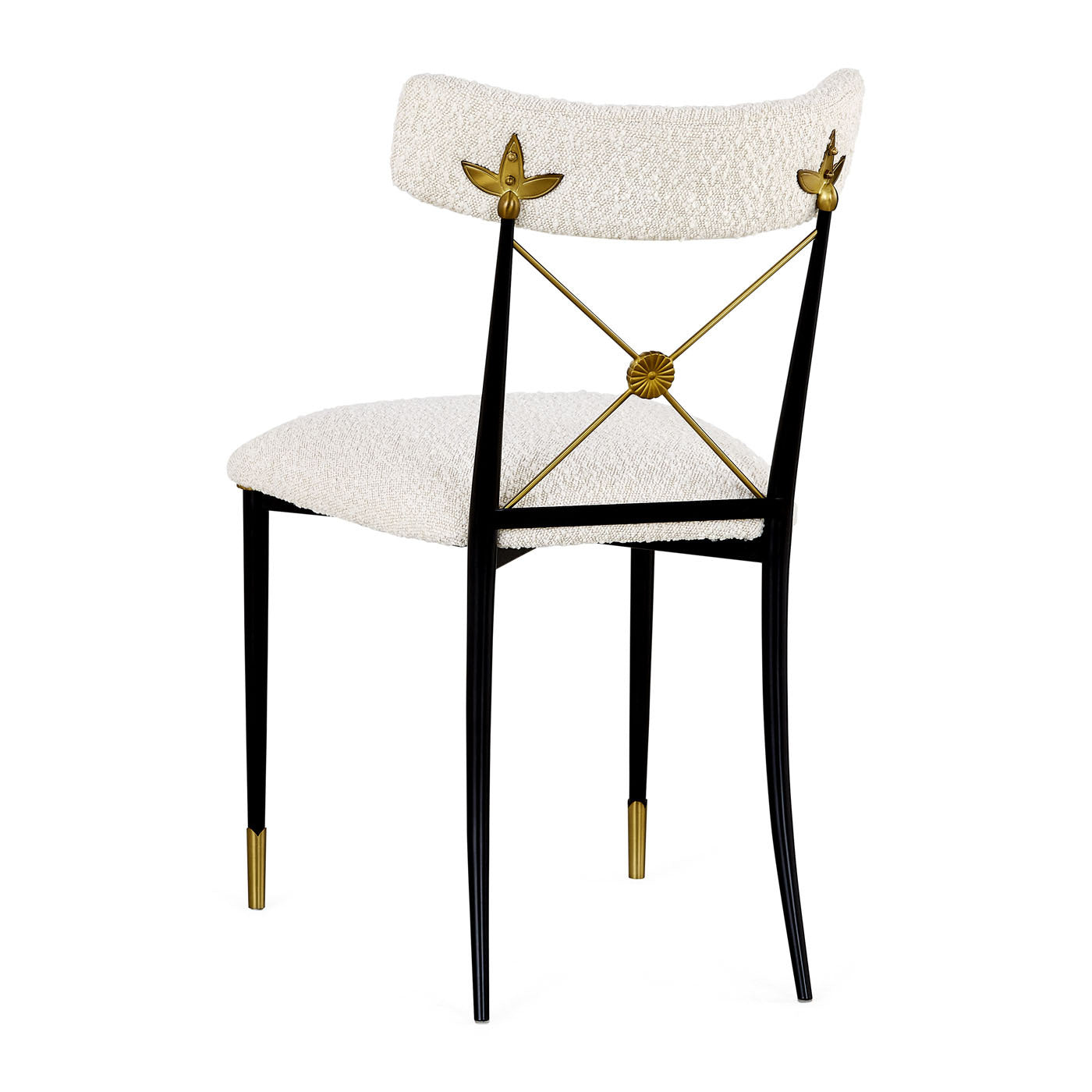 Decorative chair with white cushioned seat and backrest, gold accents, and black legs on a white background.