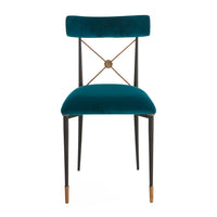 Teal velvet chair with black metal legs on a white background