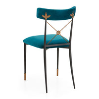 Teal chair with gold accents on a white background
