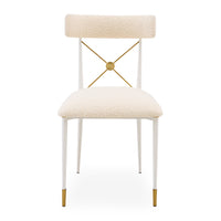 Beige chair with gold accents on a white background