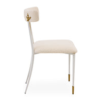 White chair with gold accents on a white background